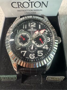 #107 Croton Black Dial Watch with Red Accents